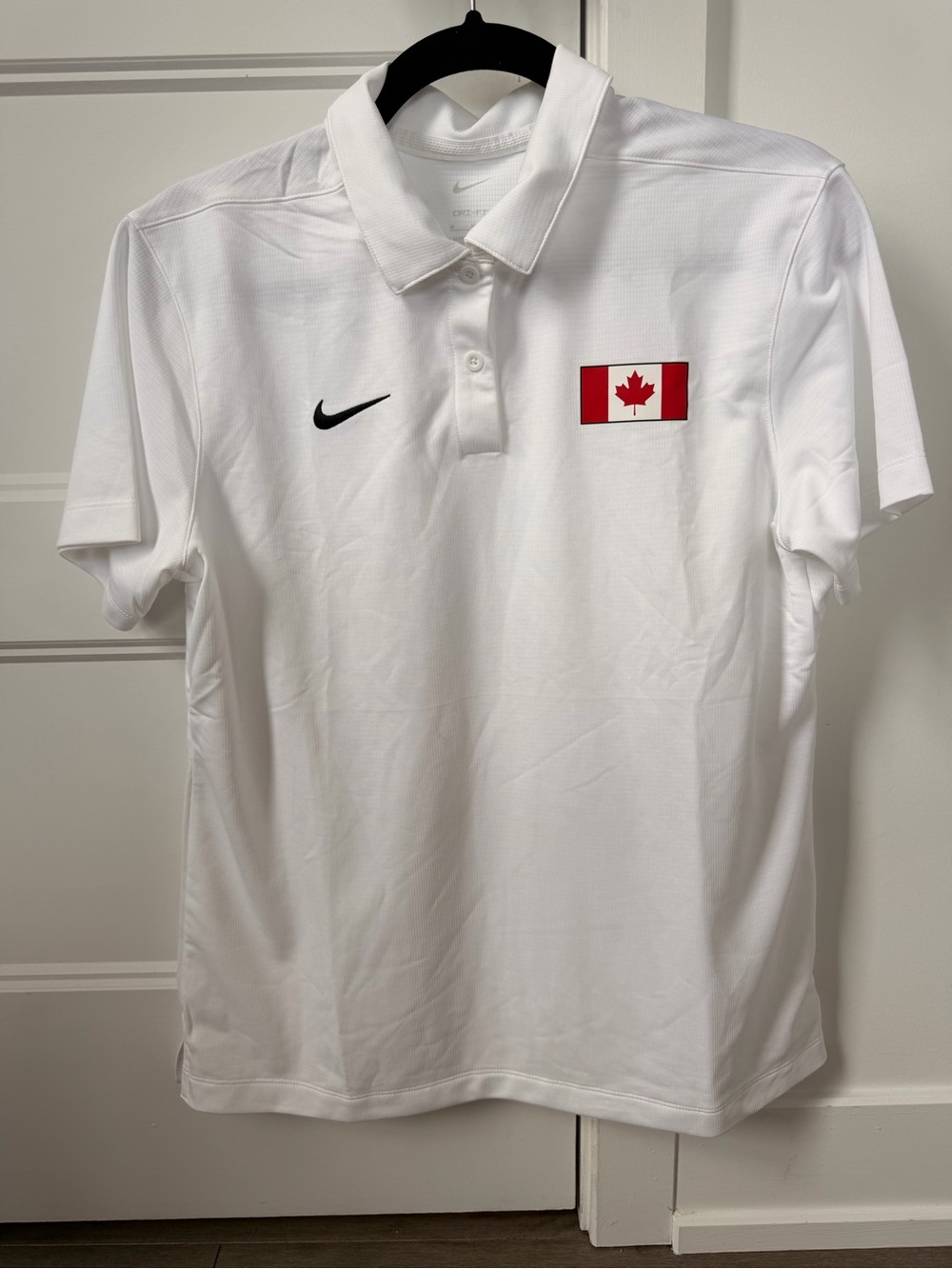 Nike White Women’s Polo with Canadian Flag Patch